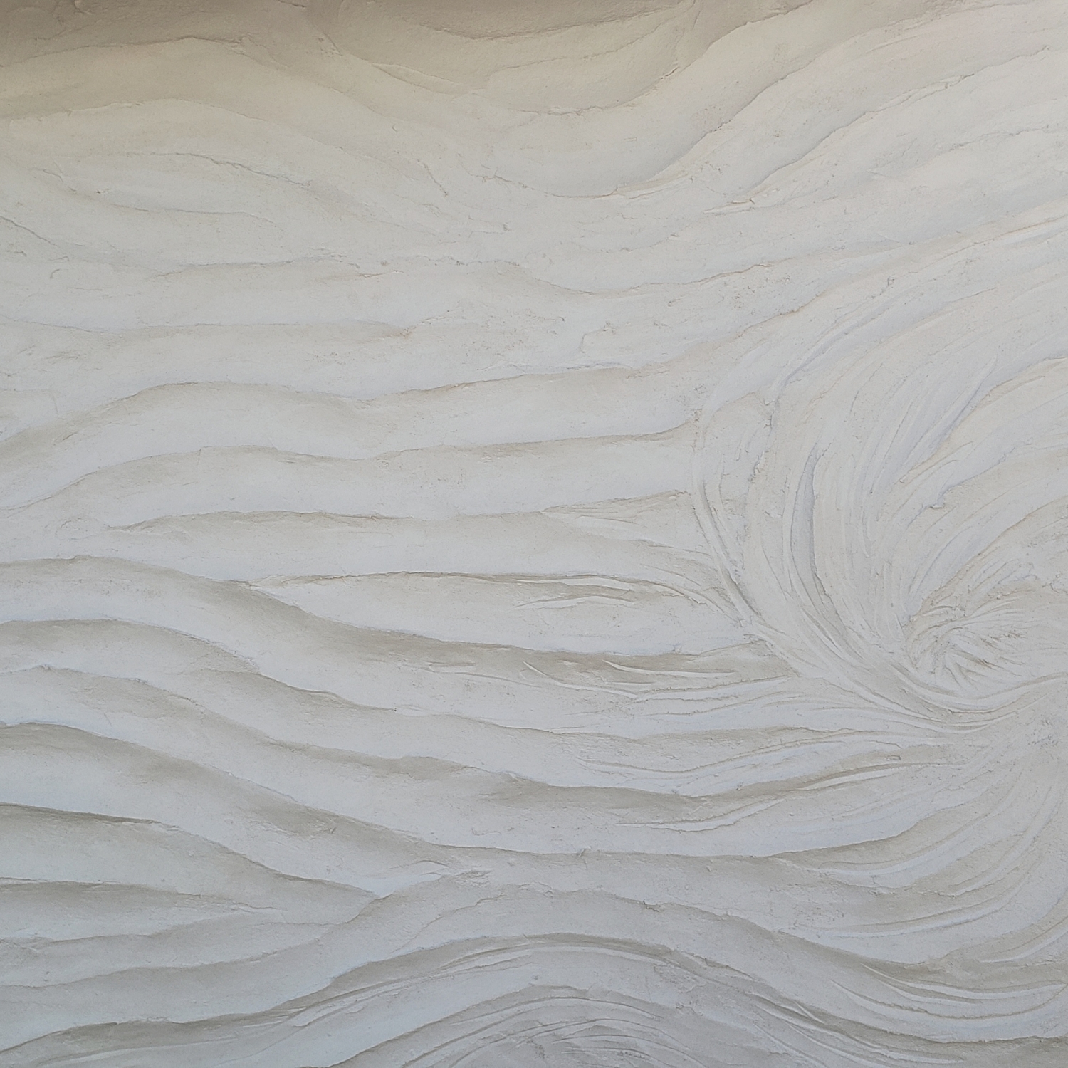 近畿壁材 打ち寄せる波のような清潔感がある白い壁